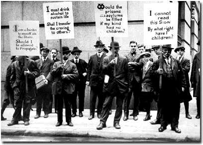poor-men-hold-signs-given-to-them-by-eugenics-supporters-on-wall-street-1915