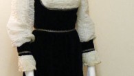 When I saw this 1960’s mod-meets-Edwardian little black velvet mini dress, which looks like a jumper over cream ruffled blouse and trimmed in gold braiding, I instantly thought of Goldie...