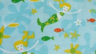 Fabric Swatch Friday: Mermaids Retro novelty print fabric with mermaids and fishes; via The Dream Merchants II